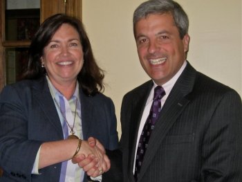 CTCF Board Member, Christopher Rupp,Vice President with Morgan Stanley presents fellow Board Member, Debbie Stauble with a generous donation from Morgan Stanley.